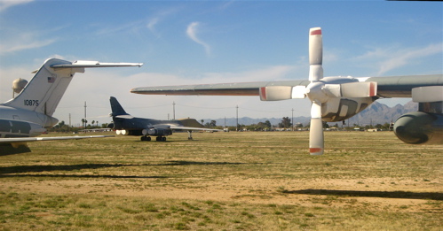 B-1 bomber with C-130 at Davis-Monthan boneyard