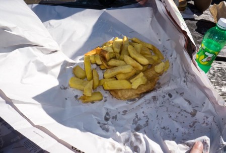 Fish, chips. Ketchup and tartar sauce cost extra.