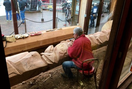 So there's this guy who, apparently, has been trapped in a glass cage, but is trying to make the best of it by spending his time hand-carving totem poles. Takes all kinds, I guess.